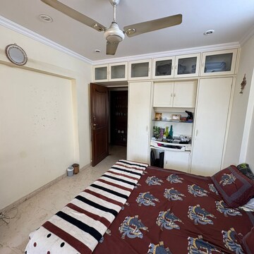 Bedroom in 2 BHK Apartment at Landmark Building Bandra West, Carter Road – for Rent