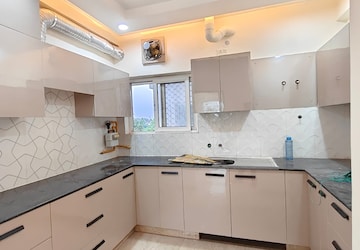 Kitchen in 3 BHK Apartment at Ansal Crown Heights, Sector 80 – for Rent