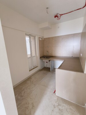 Kitchen in 2 BHK Apartment at Dosti West County, Balkum Pada – for Rent