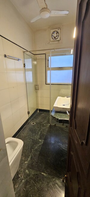 Bathroom in 3 BHK Builder Floor at Boutique Residential Apartments C-253, Defence Colony – for Rent