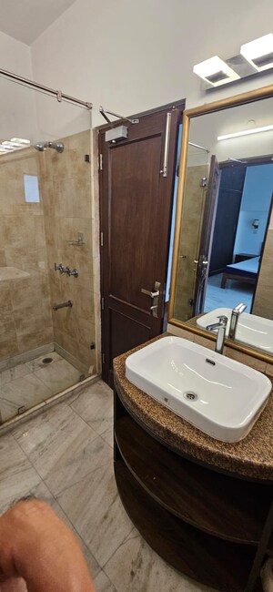 Bathroom in 3 BHK Builder Floor at Boutique Residential Apartments C-253, Defence Colony – for Rent