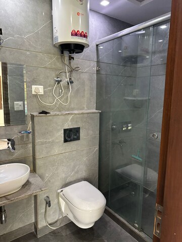Bathroom in 3 BHK Apartment at Triveni Apartments CGHS, Paschim Vihar – for Rent