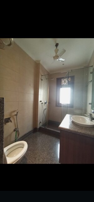 Bathroom in 3 BHK Builder Floor at Pamposh Enclave – for Rent