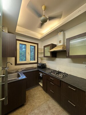 Kitchen in 3 BHK Builder Floor at Panchsheel Enclave – for Sale