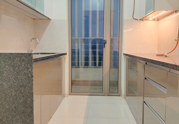 Kitchen in 2 BHK Apartment at Kalpataru Paramount, Kapur Bawdi – for Rent