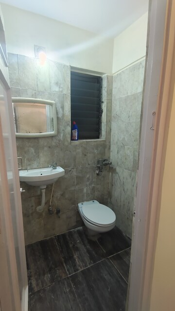 Bathroom in 1 BHK Apartment at Amaltas CHS Vasant Vihar, Vasant Vihar – for Sale