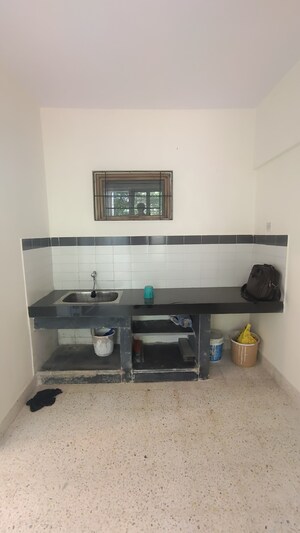 Kitchen in 1 BHK Apartment at Amaltas CHS Vasant Vihar, Vasant Vihar – for Sale