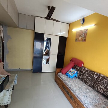 Bedroom in 2 BHK Apartment at Green Square, Pratha Pushp Society – for Sale