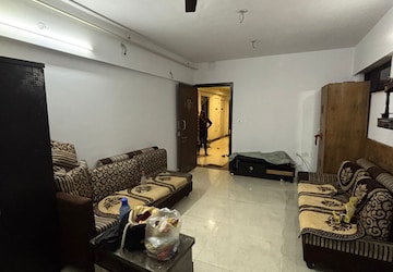 Living Room in 1 BHK Apartment at Lodha Palava City, Dombivli East – for Rent