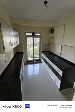 Kitchen in 3 BHK Apartment at Rustomjee Athena, Majiwada – for Rent