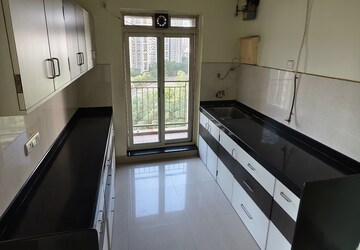 Kitchen in 3 BHK Apartment at Rustomjee Athena, Majiwada – for Rent