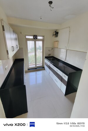 Kitchen in 3 BHK Apartment at Rustomjee Athena, Majiwada – for Rent