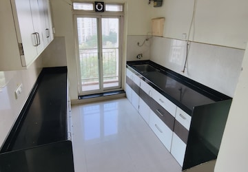 Kitchen in 3 BHK Apartment at Rustomjee Athena, Majiwada – for Rent