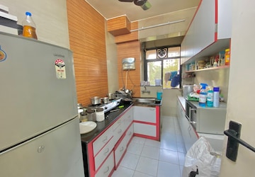 Kitchen in 2 BHK Apartment at Rustomjee Azziano Wing D, Thane West – for Rent