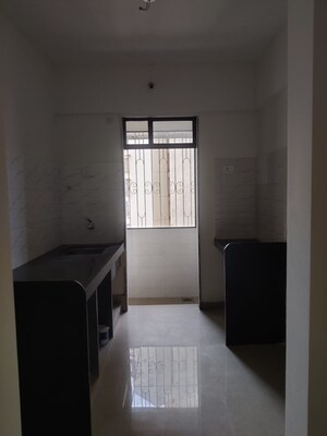Building Lobby in 1 BHK Apartment at Pushpanjali Heights, Owale – for Rent