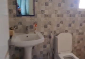 Bathroom in 2 BHK Apartment at Nilaya Greens, Sikrod – for Sale