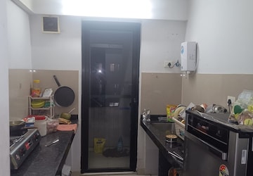 Kitchen in 1 BHK Apartment at Lodha Palava Downtown, Dombivli East – for Rent