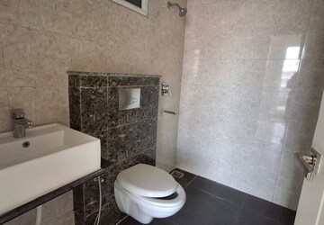 Bathroom in 3 BHK Apartment at Maxxus Elanza, International Airport Road – for Rent