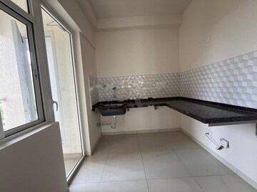 Kitchen in 2 BHK Apartment at Godrej Green Vistas, Mahalunge – for Rent