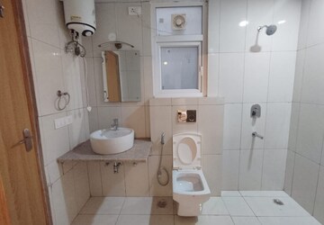 Bathroom in 3 BHK Apartment at Emaar Palm Gardens, Sector 83 – for Sale
