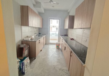 Kitchen in 3 BHK Apartment at Emaar Palm Gardens, Sector 83 – for Sale