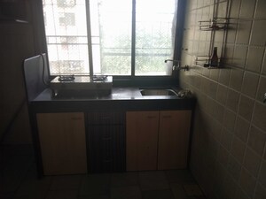 Kitchen in 1 RK Apartment at Dheeraj Savera 1, Borivali East – for Sale