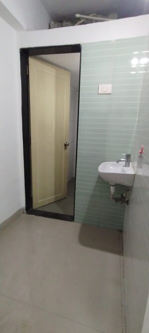 Bathroom in 2 BHK Apartment at Haware Estate, Kasarvadavali – for Rent
