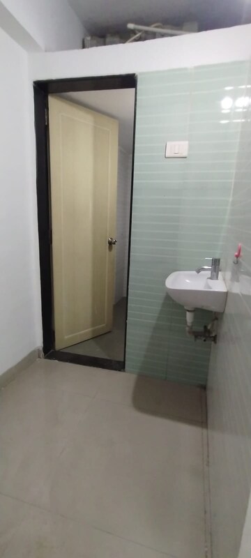 Bathroom in 2 BHK Apartment at Haware Estate, Kasarvadavali – for Rent