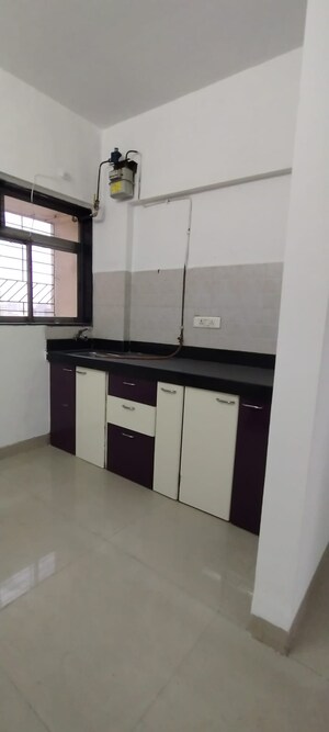 Kitchen in 2 BHK Apartment at Haware Estate, Kasarvadavali – for Rent