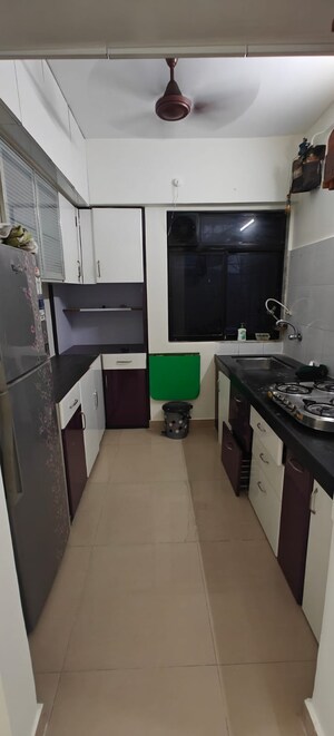 Kitchen in 1 BHK Apartment at Ram Pushpanjali Residency, Owale – for Rent