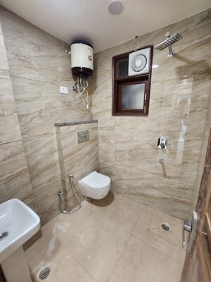 Bathroom in 2 BHK Builder Floor at Chattarpur – for Rent