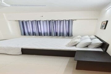 Bedroom in 2 BHK Apartment at Gurukrupa Astter, Wadgaon Sheri – for Rent