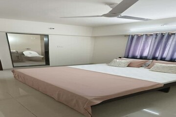 Bedroom in 2 BHK Apartment at Gurukrupa Astter, Wadgaon Sheri – for Rent