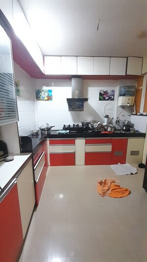 Kitchen in 2 BHK Apartment at Sangameshwari Apartment, Dattawadi – for Sale