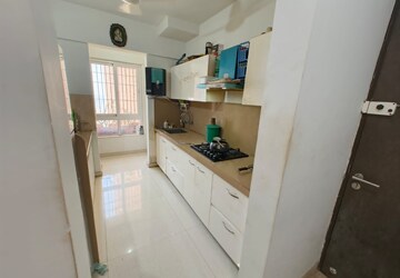Kitchen in 3 BHK Apartment at Puranik Rumah Bali, Ghodbunder Road – for Rent
