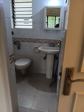 Bathroom in 2 BHK Apartment at Raheja Gardens, Wanwadi – for Rent