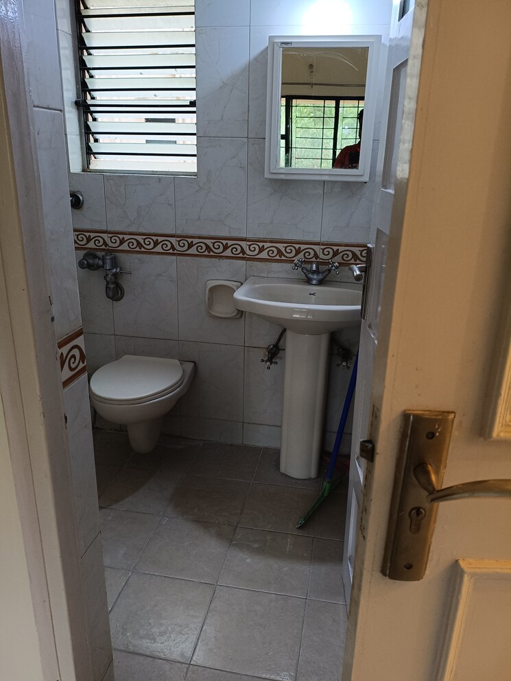 Bathroom, raheja-gardens 2 Bedroom 1200 Sq.Ft. Apartment In Wanwadi Pune 9357731