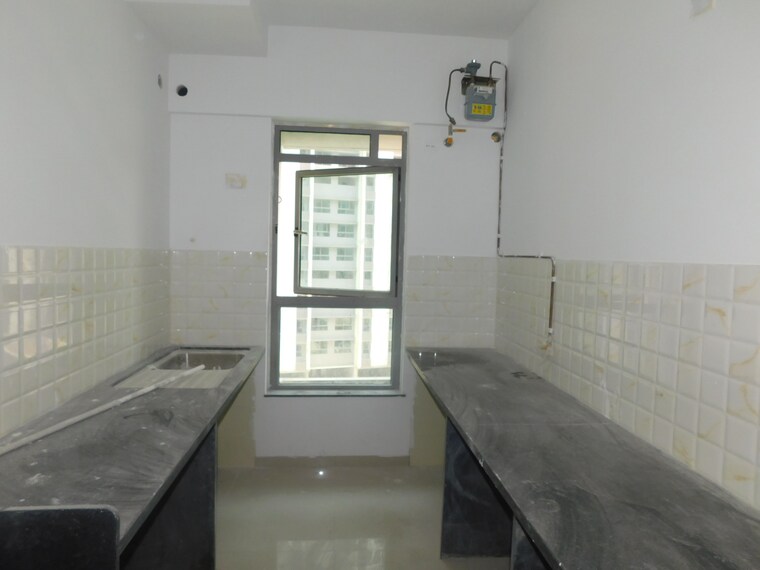 Kitchen, piramal-vaikunth 2 Bedroom 708 Sq.Ft. Apartment In Balkum Pada Thane 9358355