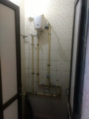 Bathroom in 1 BHK Apartment at Mahalaxmi CHS Worli, Worli – for Rent