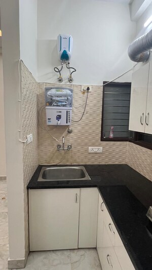 Kitchen in 1 BHK Builder Floor at Aman Vihar – for Sale