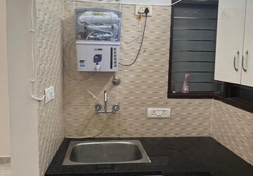 Kitchen in 1 BHK Builder Floor at Aman Vihar – for Sale