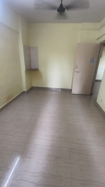 Living Room in 1 BHK Apartment at Kopar Khairane – for Sale
