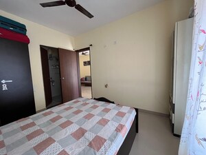 Bedroom in 2 BHK Apartment at Alliance Nisarg, Wakad – for Rent
