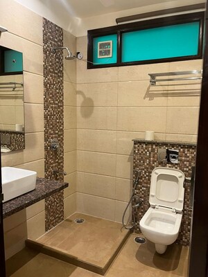 Bathroom in 3 BHK Builder Floor at Auram Floor, South City 2 – for Rent