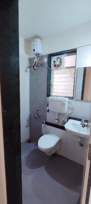 Bathroom in 2 BHK Apartment at Shroff Signature Heights, Wakad – for Rent