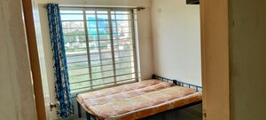 Bedroom in 2 BHK Apartment at Shroff Signature Heights, Wakad – for Rent