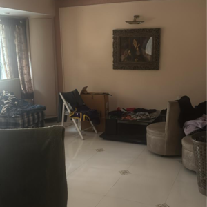 Living Room in 2 BHK Apartment at Atlas Skywalker CHS, Lokhandwala Complex – for Rent