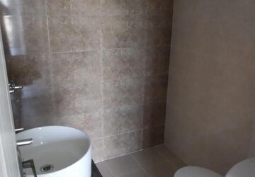 Bathroom in 3 BHK Apartment at Sushma Valencia, International Airport Road – for Rent