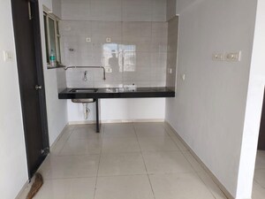 Kitchen in 1 BHK Apartment at Paranjape Schemes Abhiruchi Parisar, Dhayari – for Rent