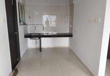 Kitchen in 1 BHK Apartment at Paranjape Schemes Abhiruchi Parisar, Dhayari – for Rent